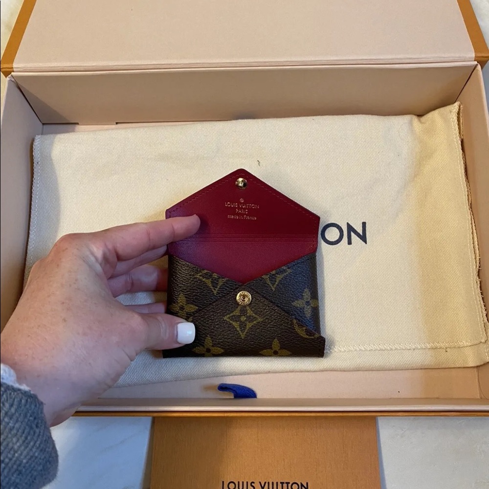 Authentic Louis Vuitton Kirigami Pouch size small with chains & insert